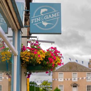 About Fin and Game - Store Sign Outside