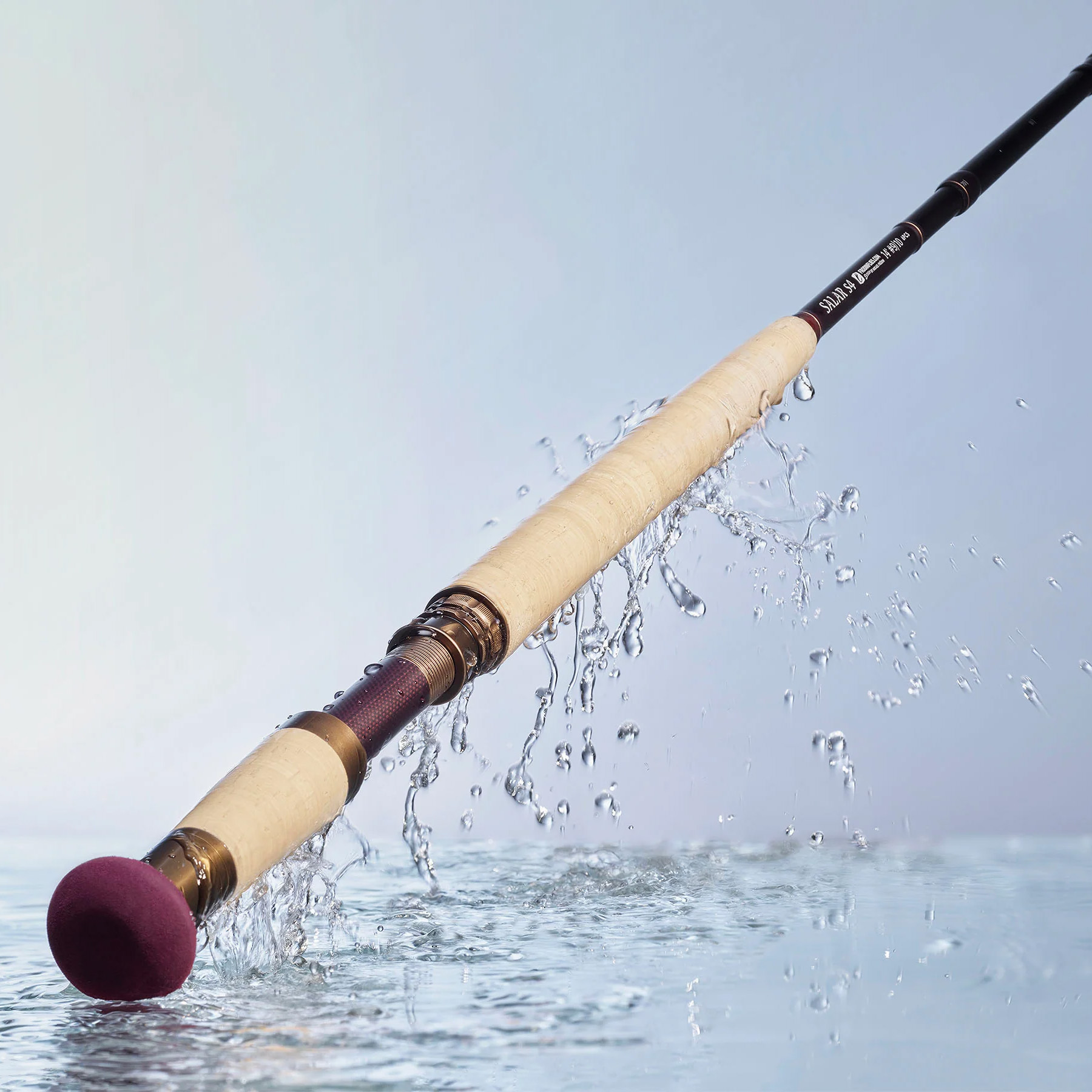 Frodin Salar S4 DH Fly Rod studio Image with water falling